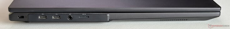左侧:Kensington 锁孔、2 个 USB-C 4.0 接口(支持 Thunderbolt 4,40 Gbps,DisplayPort 2.1,Power Delivery)、3.5 毫米立体声插孔、microSD 卡读卡器