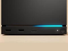 Valve Steam Machine 的正面图,配有双 USB 端口、一个 USB-C 端口、一个电源 LED、一个圆形电源按钮和一个蓝色 LED 灯带。(图片来源:Valve)