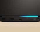Valve Steam Machine 的正面图，配有双 USB 端口、一个 USB-C 端口、一个电源 LED、一个圆形电源按钮和一个蓝色 LED 灯带。(图片来源：Valve）