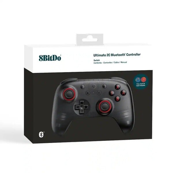 半透明黑色 8bitDo Ultimate 2C Bluetooth 附带两个操纵杆帽。(图片来源：8BitDo）