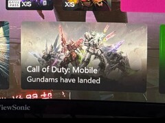 Xbox 仪表板截图，显示以高达机甲为主题的《使命召唤：机动战士》广告，标题为 