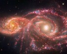 詹姆斯-韦伯太空望远镜拍摄的图像，显示两个星系 IC 2163 和 NGC 2207 正在合并。(图片来源：© NASA, ESA, CSA, STScI）