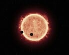 显示一颗恒星和两颗行星的插图。