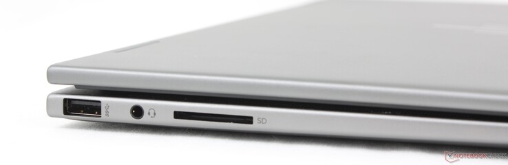 左：USB-A 10（10 Gbps）、3.5 毫米耳机、SD 读卡器