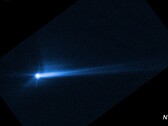 美国国家航空航天局（NASA）的 DART 航天器故意撞击迪莫弗埃后从其表面炸出的碎片（图片来源：NASA、ESA、STScI 和哈勃；经过裁剪