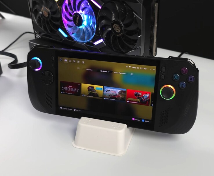 华硕 ROG Ally X 手持设备与外置 Oculink eGPU 底座中的 AMD Radeon RX 9070 XT 相连，屏幕上显示的游戏包括《蜘蛛侠 2》、《赛博朋克 2077》、《地平线 5》和《边陲 4》（图片来源：ETA PRIME via YouTube）