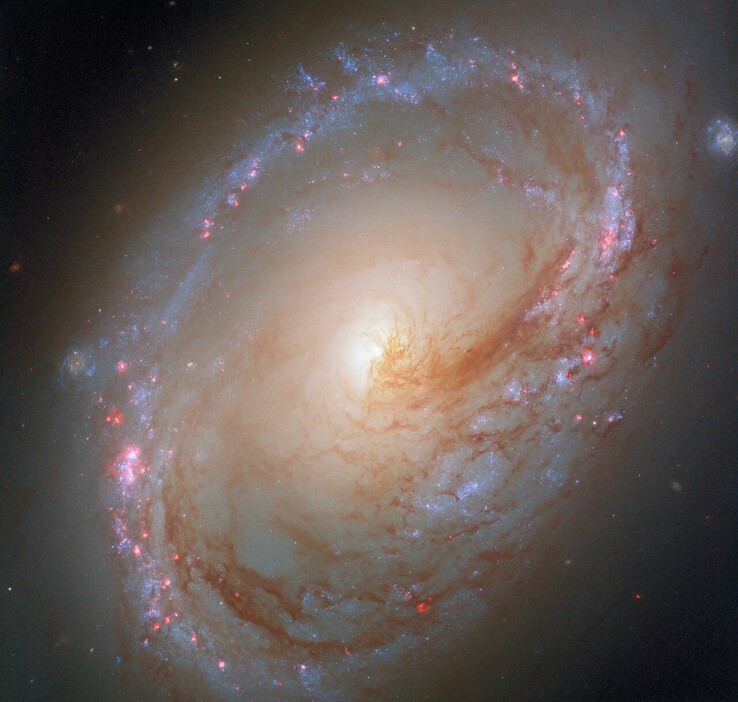 Messier 96星系的最新图像（图片来源：欧空局、美国国家航空航天局、F. Belfiore和D. Calzetti）