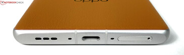 底部：扬声器、麦克风、USB-C 3.2 Gen.1、麦克风、双 SIM 卡