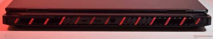 背面：专有充电、HDMI、RJ45 以太网