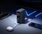 Spacemate RD1 内置 GaN 电源。图示：展示该扩展坞为多台设备充电的宣传图片。