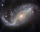 显示星系 NGC 1672 和宇宙中恒星的图片。(图片来源：WikiImages - Pixabay）