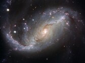 显示星系 NGC 1672 和宇宙中恒星的图片。(图片来源:WikiImages - Pixabay)