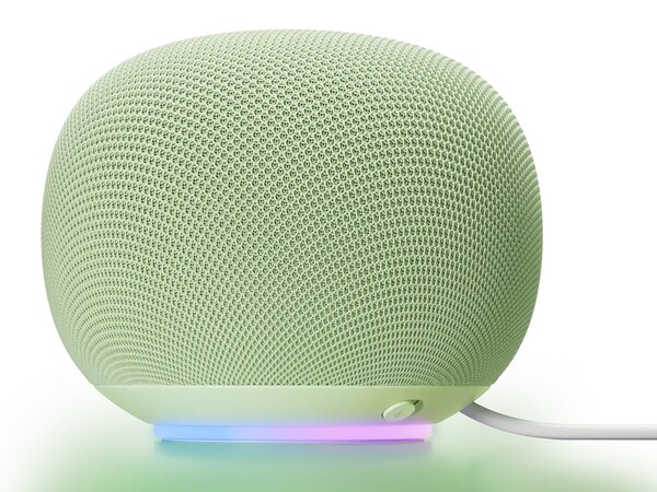 谷歌 Home 扬声器有一个环形指示灯和一个麦克风静音按钮。(图片来源：谷歌）