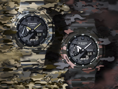 从左到右：迷彩背景下的卡西欧 G-Shock GA-2100CM-5A 和 GA-2100CM-8A。