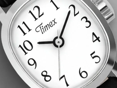 全新 Timex Cavatina Mini 腕表配备简洁、极简风格的表盘。