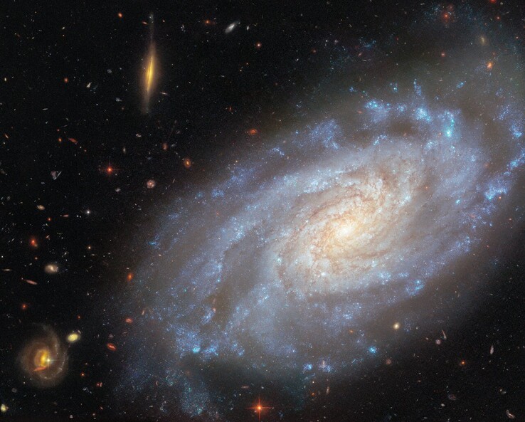 哈勃拍摄的 NGC 3370 图像（图片来源：欧空局/哈勃、美国国家航空航天局、A. Riess 和 K. Noll）