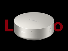 图中的联想 Yoga Mini i 迷你电脑以黑色为背景,顶部印有联想标志(图片来源:Lenovo - 已编辑)