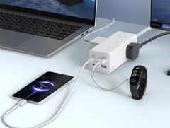 小米 65W 电源底座有望在更多市场推出。(图片来源：小米）