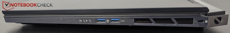 右：2 个 USB-A（5 Gbps），Kensington