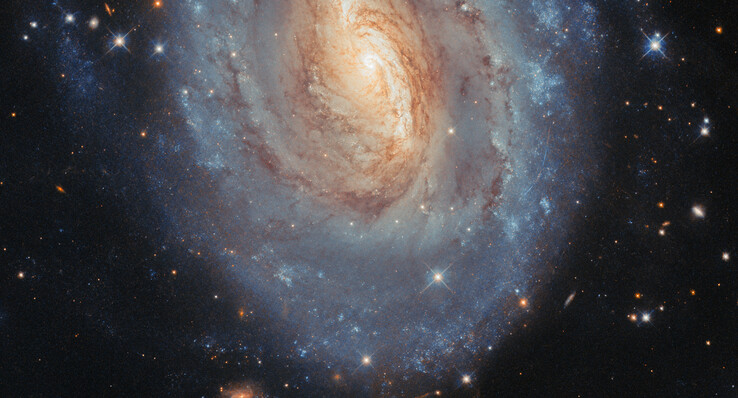 NGC 6000 的图像（图片来源：欧空局/哈勃、美国国家航空航天局和 A. Filippenko）