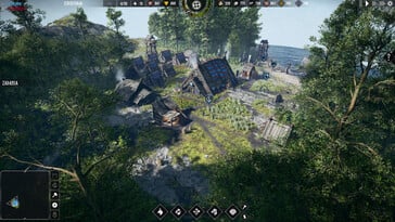 一张展示弗罗森海姆(Frozenheim)建筑和田野的图片。