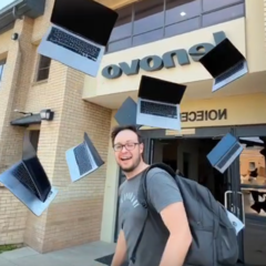 笔记本电脑自行飞出大楼。使用 Grok 生成（图片来源：Notebookcheck - Darryl Linington）