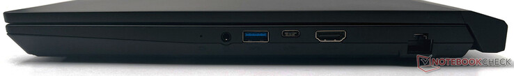 右边。电池指示灯，3.5毫米组合音频插孔，USB 3.2 Gen1 Type-A，USB 3.2 Gen1 Type-C，HDMI 2.0b输出，RJ-45千兆以太网