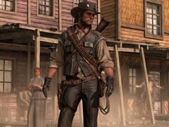 约翰-马斯顿（John Marston）在《红色死亡救赎》（Red Dead Redemption）中的一个城镇场景中（图片来源：Rockstar Games