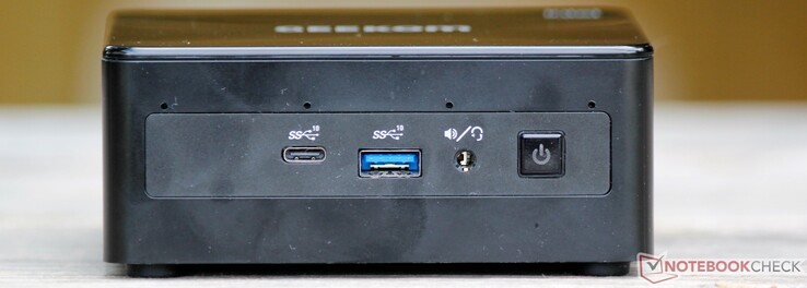 正面：四麦克风阵列，USB-C 3.2 Gen 2，USB-A 3.2 Gen 2，组合音频插孔，电源按钮
