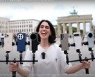 vivo X200 Ultra 荣膺变焦摄影之王。图为手持测试手机的人。(图片来源：Versus；已裁剪）