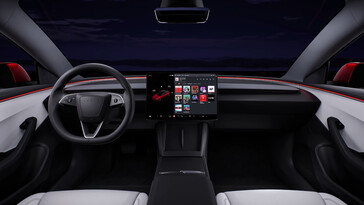特斯拉称已对 Model 3 的材料进行了升级，并在信息娱乐屏幕下配备了双无线充电器。(图片来源：特斯拉）