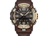 G-Shock Mudmaster GG-B100XMH-5A 的特写镜头，展示了其浅黄金色与棕色的表壳和表圈。