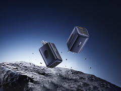 新款 PicoGo 67 W AE11 售价 39.99 美元。图为快速充电器漂浮在岩石上的宣传图片。(图片来源：Baseus）