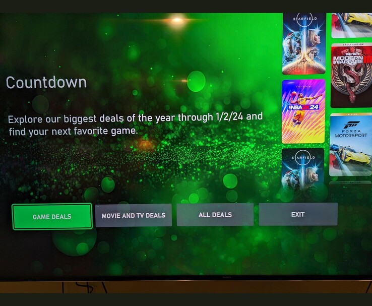 Xbox 系列仪表盘显示倒计时促销宣传片，其中包括《星际争霸》、《NBA 2K24》等折扣。(图片来源：Reddit/u/tapo via r/XboxSeriesX）