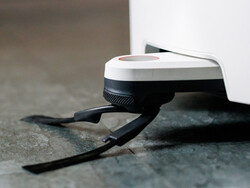 机械臂可自动伸展，以便彻底清洁角落。(图片来源：丹尼尔-施密特）