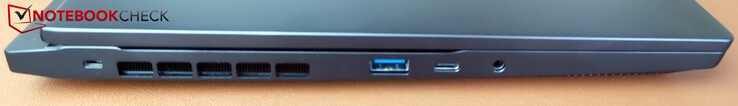 左：Kensington、USB-A（5 Gb/s）、USB-C（5 Gb/s，无附加功能）、3.5 毫米耳机插孔