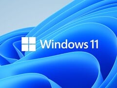 Windows 11 的官方品牌标识,作为微软 2026 年 8 月“补丁星期二”活动的背景。