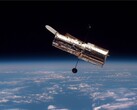 哈勃太空望远镜在地球轨道上的图像（图片来源：欧空局；已裁剪）