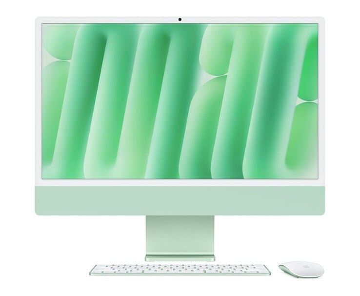 Apple 24 英寸 iMac 显示为绿色，配有配套键盘和鼠标（图片来源：Apple)