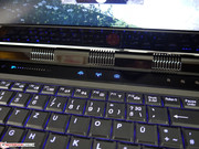 The LED status bar is quite bright in the dark and is also reflective.