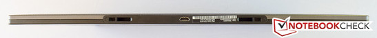 Bottom: Micro-USB port (flanked by dock connectors)