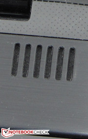 The speakers are located above the keyboard.