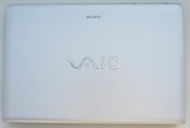 The rear side of the lid is made of a matt white plastic.