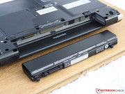We remove the 66 Wh Lithium-Ion battery to get a look inside the laptop.