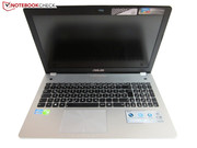 While the keyboard is encompassed by a silver metal surface,