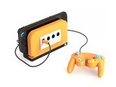 带有香料橙面板的 Retro Fighters BattleDock。(图片来源：Retro Fighters/Kickstarter）