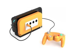 带有香料橙面板的 Retro Fighters BattleDock。(图片来源：Retro Fighters/Kickstarter）