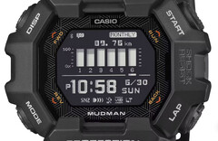Casio G-Shock Mudman GDG-B100 手表配有红白数字显示屏,背景为崎岖的山地景观。