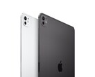 特写展示了银色和太空黑外观的 iPad Pro 背面设计，突出显示了摄像头和铝边框 (图片来源：Apple)