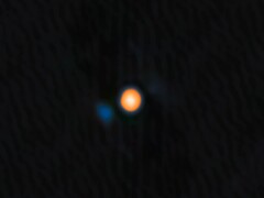 参宿四及其伴星 Siwarha 的图像（图像来源：NASA、JPL 和 NOIRLab；已裁剪）。